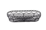 A black powder coated metal, oval-shaped wire basket from the Mediterranean Collection Basket by TableCraft, features decorative swirls along the rim and open sides. Its simple, airy design is perfect for holding fruits or bread.
