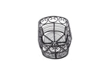 A black powder coated metal wire basket from the Mediterranean Collection Basket by TableCraft is shown from above. Its open, airy design features curved and spiral patterns, creating an intricate, decorative look against a plain white background.