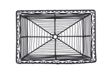 A rectangular black basket from the Mediterranean Collection, crafted from powder coated metal with decorative swirling edges and a grid base featuring a small central circle. The basket is viewed from above against a plain white background.