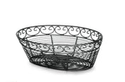 A black powder coated metal oval basket from the TableCraft Mediterranean Collection Basket line. Its open design features elegant swirling patterns along the top edge, highlighting intricate, airy metalwork against a white background.