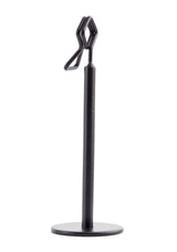 A sleek TableCraft number/card holder stand featuring a black powder coated metal finish, with a round flat base, vertical cylindrical post, and a geometric wire holder at the top for upright display.