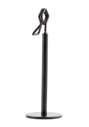A sleek TableCraft number/card holder stand featuring a black powder coated metal finish, with a round flat base, vertical cylindrical post, and a geometric wire holder at the top for upright display.