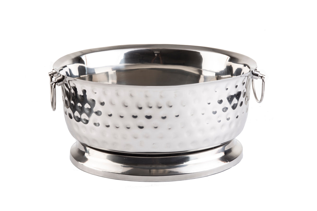 A shiny, silver Bali Collection Beverage Tub with a hammered texture, round base, and two side rings for handles. This stainless steel beverage tub is empty and sits on a white background.