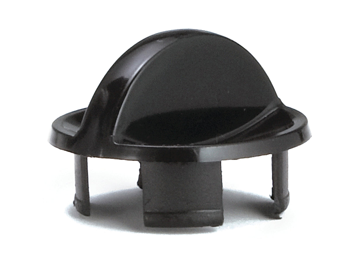A black plastic automotive fastener, featuring a domed top with a small tab, circular base, and three prongs extending downward for securing into a panel or hole. Made in USA, its smooth and shiny surface has small notches visible at the bottom.