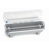 A translucent plastic dispenser with a hinged lid is open, revealing metal bars and rollers inside. The light gray KenKut 3 base features blue accents and short legs for stability, designed for dispensing or storing rolled materials.