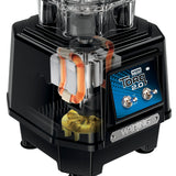 A cutaway view of the black Waring Torq 2.0 Heavy Duty Blender base reveals the internal motor and copper coils. The front panel has a blue label with the brand name and Torq 2.0, plus two metal switches, showcasing both external and internal features.