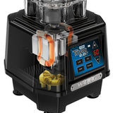 A close-up of a Waring Torq 2.0 countertop blender base, shown with a cutaway view revealing copper motor coils inside. The base features a digital display panel with buttons labeled Stop, Pulse, and arrows, displaying 60 in red numbers.