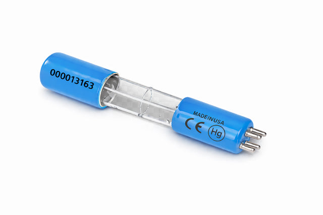 A small cylindrical UV Replacement Bulb for Koolaire, model K00454, with blue end caps, silver electrical pins, and a clear glass tube center. The left cap shows 000013163; the right reads MADE IN USA, CE and Hg symbols, plus three metal pins.