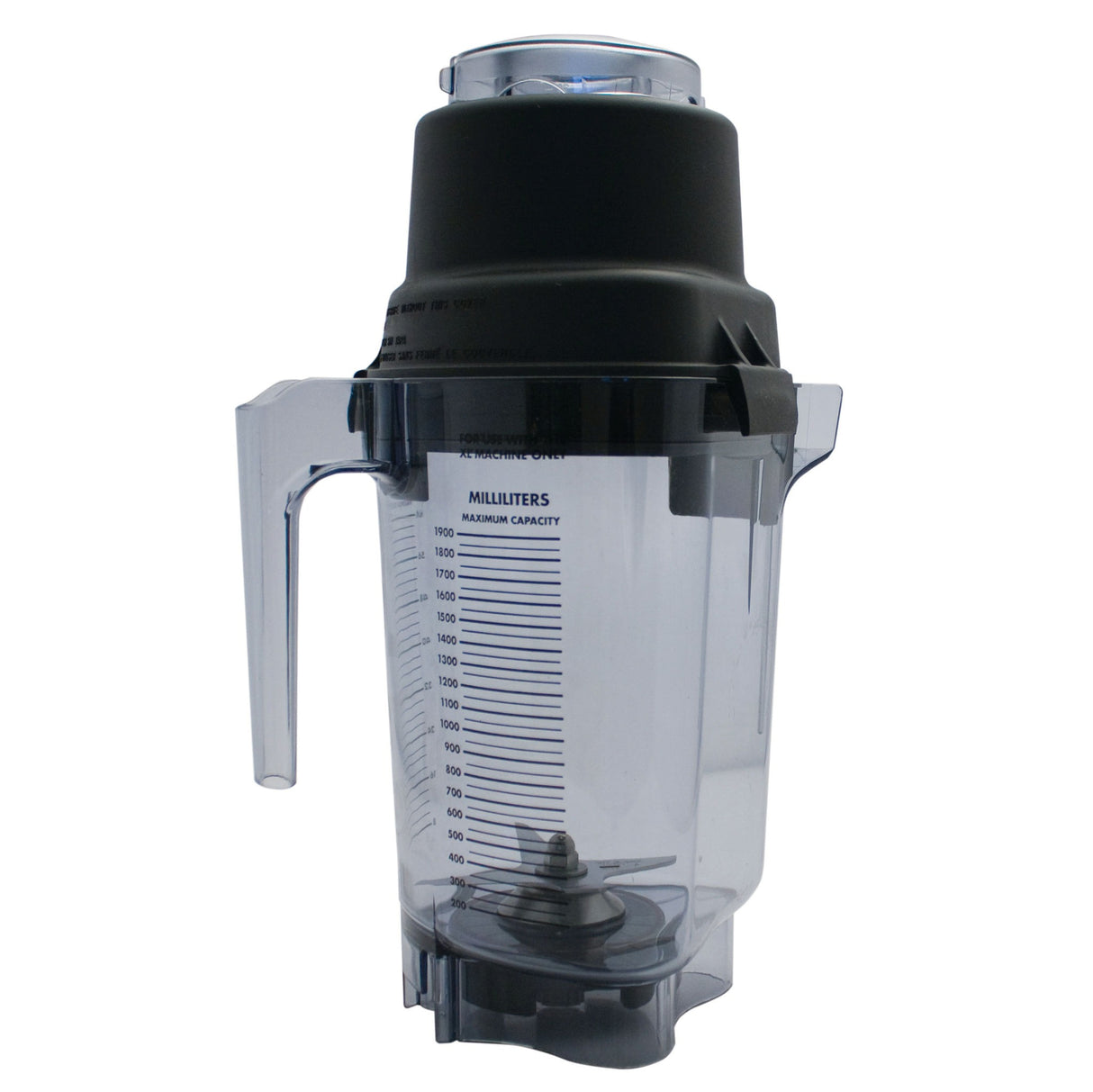 A clear plastic Vitamix container with measurement markings in milliliters, a black handle, and black lid. Metal blender blades are visible at the bottom. This 64 oz blender jar stands upright on a white background.