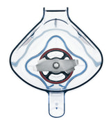 Top-down view of a Vitamix blender container, highlighting the Advance blade assembly inside its teardrop shape. The 32 oz Tritan container features blue-tinted edges and a circular black and red base surrounding the central blade.