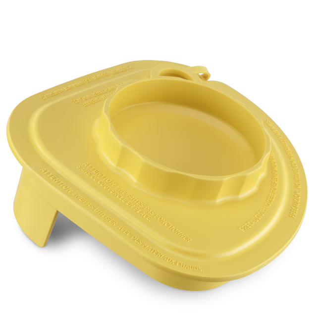 A yellow, plastic microwave egg cooker with a round central compartment and raised edges. The design, reminiscent of Advance containers, features embossed safety instructions and a tab on one side for easy handling—ideal for cooking or steaming eggs in a microwave.