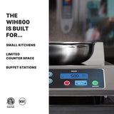 A stainless steel Induction Range cooktop with a pot on top emits steam. Its digital display shows 500 and controls glow. Text on the left highlights that the WIH800 is built for small kitchens, limited countertop space, and buffet stations. NSF and Intertek logos appear below.