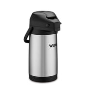 A stainless steel Café Deco Airpot with a black plastic lid, handle, and base. This vacuum insulated airpot features a push-button mechanism, and the brand name Waring is printed on the side. The plain white background highlights the airpot.