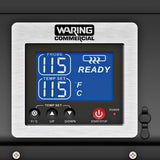A digital display on a Waring Commercial chocolate melter shows “PROBE 115°F”, “TEMP SET 115°F”, and “READY” with a heating coil icon. The countertop panel features temperature controls, unit selection, and a red power/start-stop button.