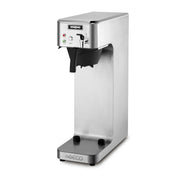 A commercial-grade, stainless steel coffee brewer with a Waring logo on the front, indicator lights, a large spout, and a black drip tray. The sleek, rectangular design is ideal for countertop use in cafés or offices.