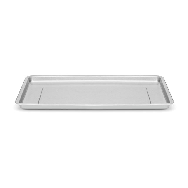 A rectangular, flat 1/2 size Baking Sheet with raised edges on all sides, crafted from silver stainless steel. The smooth, unadorned surface is ideal for baking or roasting food items in an oven. Shown on a plain white background.