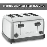 A 4 slice toaster with extra wide slots, brushed stainless steel housing, two lever controls, two browning dials, and buttons; “Brushed Stainless Steel Housing with Removable Crumb Trays” is written above in bold white text on gray.