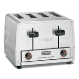 A heavy-duty commercial toaster with four slots, two black lever handles, and round dial controls on the front panel. The "Waring Commercial Heavy Duty Toaster" features a sturdy, industrial design perfect for any kitchen.
