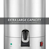 Close-up of a brushed stainless steel Coffee Urn featuring a spout, green ready light, red power switch, water level indicator, and dual heater system. Text overlay: EXTRA LARGE CAPACITY 30-Cup (Minimum) to 110-Cup Capacity.