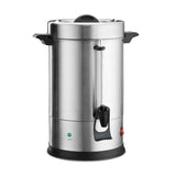 A large stainless steel coffee urn with black plastic handles, spout, and base. It features a dual heater system, clear water level indicator, green “Ready” light, red power indicator, and domed lid with black knob, plus boil dry protection for safety.