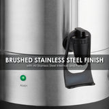 Close-up of a brushed stainless steel Coffee Urn with a black spout. A green READY light is illuminated. Text overlay reads: BRUSHED STAINLESS STEEL FINISH with dual heater system and all stainless steel internals and parts.