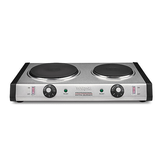 A heavy-duty Waring Professional Extra Burner with two black cast iron burners, separate temperature control knobs, and on/off switches with indicator lights, all set against a plain white background.