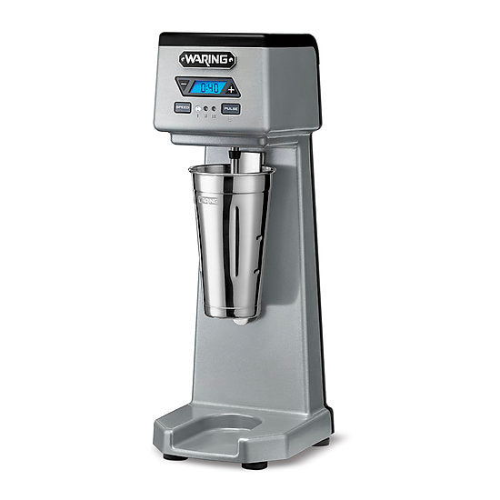 A metallic silver Waring WDM120TX drink mixer with a digital display and control buttons on the top front panel. This single spindle machine features a stainless steel mixing cup and sits on a sturdy rectangular base.
