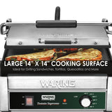 A stainless steel Waring Panini Grill with a cast iron cooking surface and large 14 x 14 area grills quesadillas. The digital control panel and adjustable thermostat make it ideal for grilling sandwiches, tortillas, quesadillas, and more.