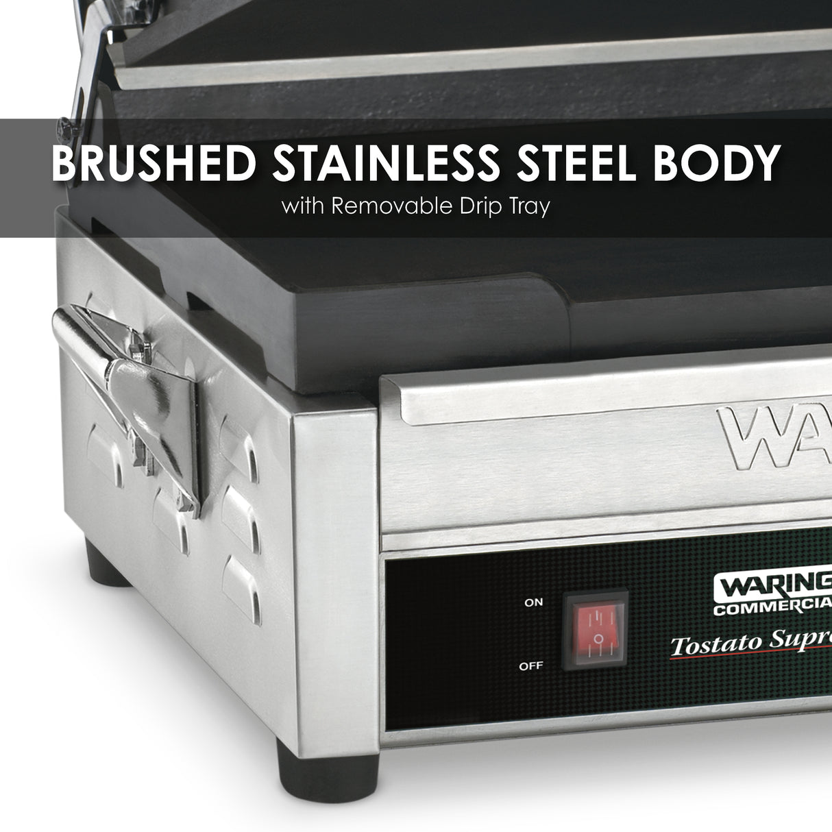 Close-up of a brushed stainless steel Panini Grill with a removable drip tray. The image highlights its sturdy metal construction, black power switch, label, and cast iron cooking surface. Overlay text reads, Brushed Stainless Steel Body.