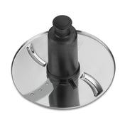 A shiny, round WFP11S metal food processor slicing disc with a black plastic center hub and safety lock. The disc has two curved slicing blades and small perforations, designed for even slicing in compatible appliances.