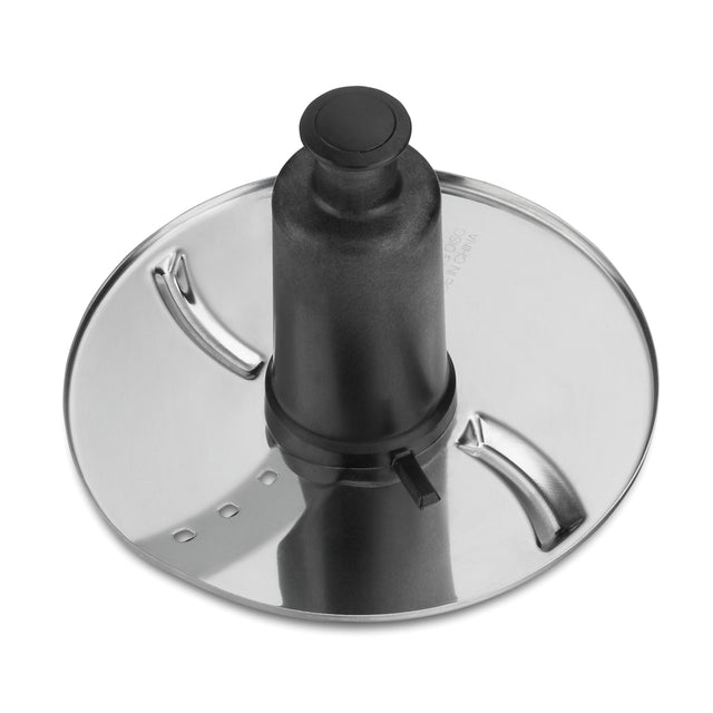 A shiny, round WFP11S metal food processor slicing disc with a black plastic center hub and safety lock. The disc has two curved slicing blades and small perforations, designed for even slicing in compatible appliances.