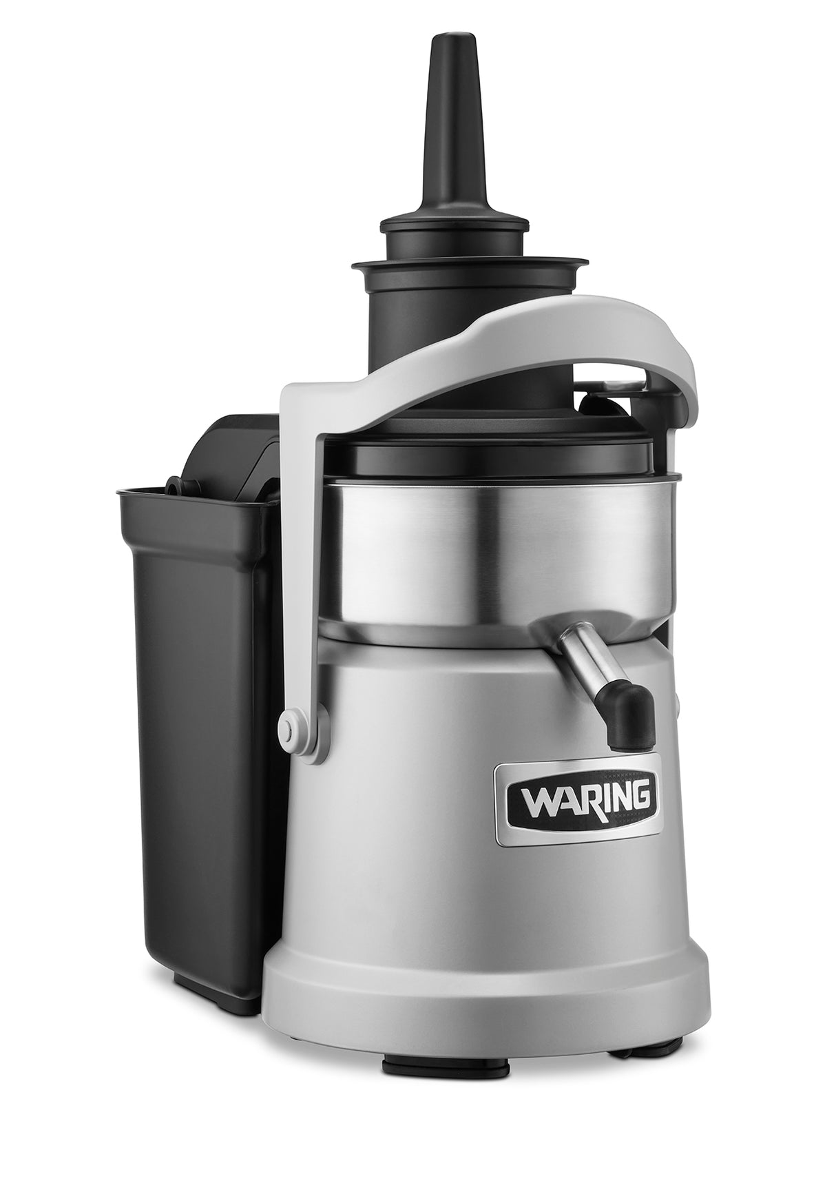 A heavy duty Waring juice extractor in silver and black features a large spout, top funnel for produce, side handle, and a black container on the left for continuous pulp ejection; the Waring logo is displayed on the front.
