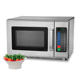 A stainless steel Waring commercial microwave oven with a digital keypad and display showing 2:30. In front of the heavy duty microwave oven is a white bowl filled with green beans, red bell peppers, and yellow bell peppers.