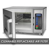 A heavy duty microwave oven with a stainless steel finish sits open, revealing interior racks. The control panel reads 2:30. A bold banner at the bottom states “CLEANABLE/REPLACEABLE AIR FILTER” in white text on a dark background.