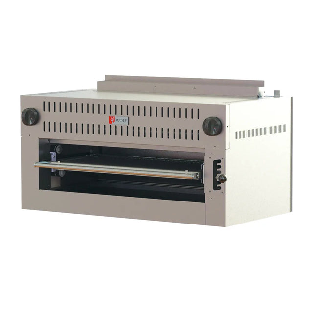 A large industrial bread slicer machine with a beige metal exterior, front-loading slot, control knobs on each top corner, a printed Wolf C36RB_LP logo in the center, and ventilation slots on the top and side panels.
