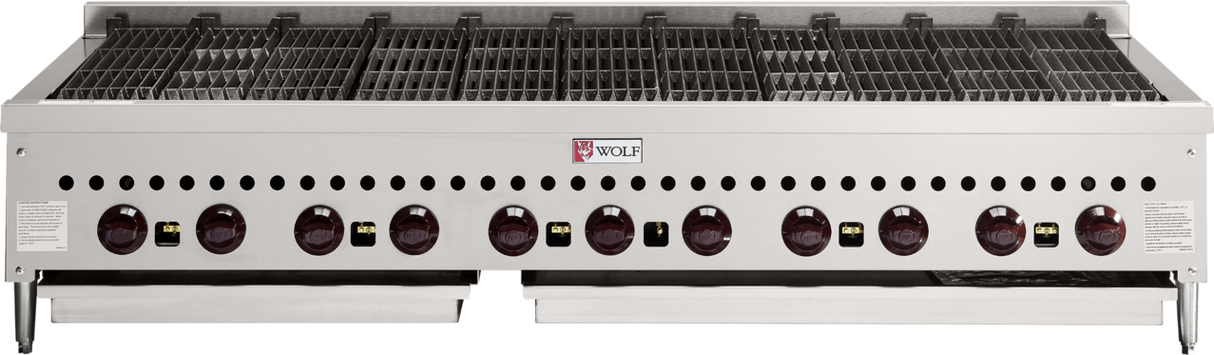 A large commercial Wolf SCB60_NAT charbroiler features a stainless steel exterior, nine black control knobs, two grease trays underneath, and a wide grilling surface with closely spaced grate bars—ideal for heavy-duty use.