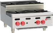 A commercial stainless steel countertop gas range with four black cast iron burners, three red control knobs, and a red Wolf logo. This professional kitchen appliance features short metal legs and a raised back guard, ideal for busy kitchens.