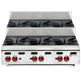 A stainless steel Wolf Achiever Hotplate stovetop with six black cast iron burners and six red control knobs. This 36-inch hotplate features a raised back panel and a sleek, professional design found in commercial kitchens.