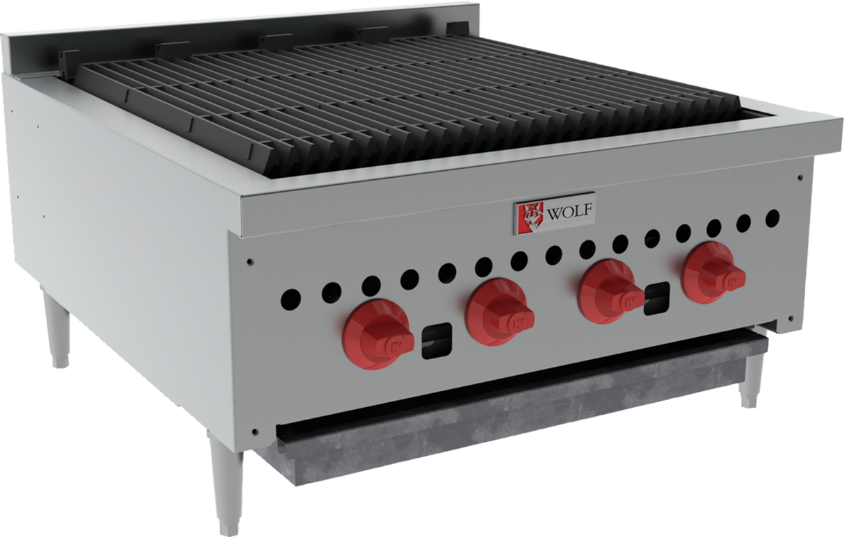 The Wolf SCB25_NAT Charbroiler is a commercial countertop charbroiler with four red control knobs, a spacious black grill surface, durable metal legs, and a stainless steel body. The front panel displays the Wolf logo and includes a drip tray below.