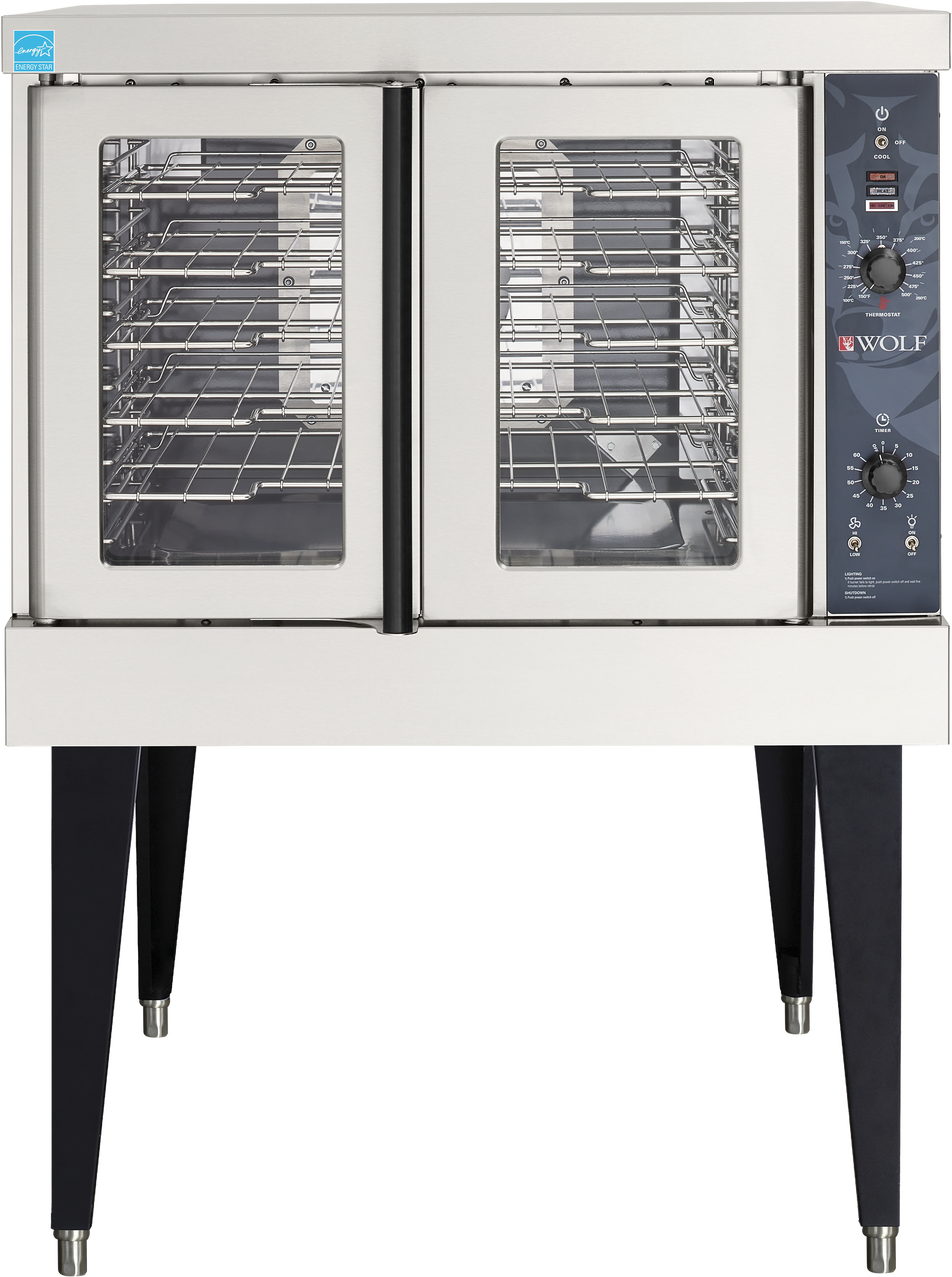 A stainless steel Wolf WC4GD convection oven with two glass doors, metal racks inside, and a black control panel on the right featuring knobs, switches, and indicator lights. The gas single-deck oven stands on four black angled legs.