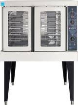 A stainless steel Wolf WC4GD convection oven with two glass doors, metal racks inside, and a black control panel on the right featuring knobs, switches, and indicator lights. The gas single-deck oven stands on four black angled legs.