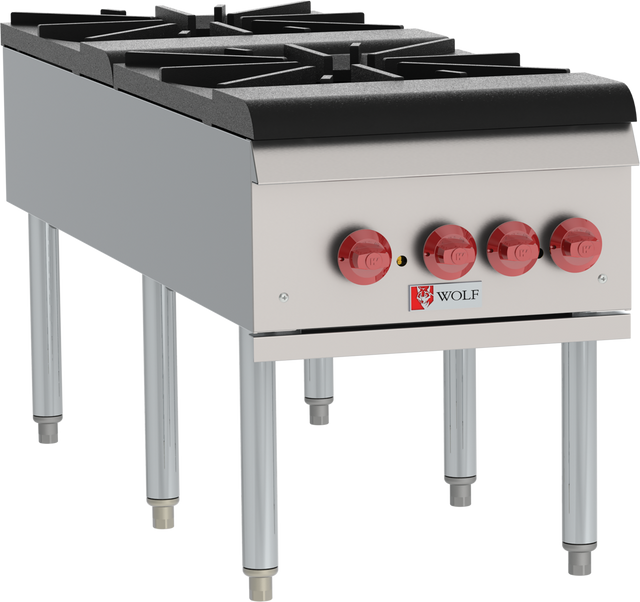 A commercial stainless steel gas range for professional kitchen use, featuring four black burners, red control knobs, and sturdy metal legs. The Wolf logo is visible beneath the knobs on this high BTU stock pot range.