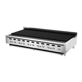 A large commercial stainless steel charbroiler with eight control knobs, black grilling grates, and a raised backsplash guard. This countertop gas charbroiler stands on short metal legs, ideal for heavy-duty professional kitchen use.
