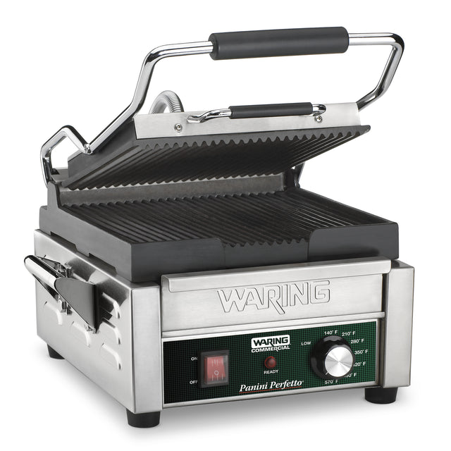 A compact panini grill with ribbed cast iron plates, featuring a stainless steel body, black handle, control panel with power switch, temperature dial, indicator lights, and the Waring Panini Perfetto branding on the front.