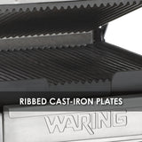 Close-up of a compact panini grill with dark, ribbed cast-iron plates. “WARING” is engraved on the brushed metal front, and white text across the image reads “RIBBED CAST-IRON PLATES.”.