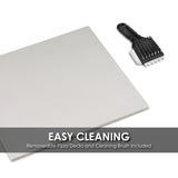A square, light-colored pizza stone sits beside a black cleaning brush with stiff bristles. A gray banner at the bottom reads: EASY CLEANING. Removable Pizza Decks and Cleaning Brush Included—perfect for any countertop pizza oven.