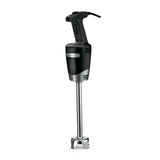 A black and silver handheld immersion blender with a long metal blending shaft, wide protective base, and trigger-style grip. Designed for medium duty use, its attached power cord and robust build reflect a professional, heavy-duty design.