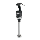 A heavy duty immersion blender with a black handle and motor housing, a silver label, and a long stainless steel blending shaft. The power cord extends from the top, and the base features a protective metal guard around the blades. White background.