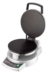 A round, silver electric tortilla press with a hinged lid opens upright, revealing two flat, circular non-stick plates—perfect for tortillas or as a crepe maker. The base features a control panel with buttons, digital display, and a handle on the top plate.