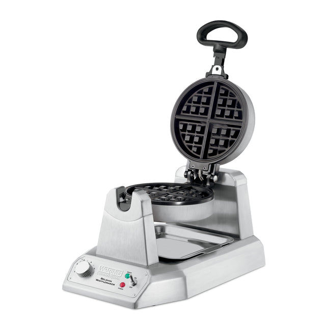 This heavy-duty Belgian Waffle Maker features a round, nonstick plate that opens vertically. Its stainless steel base includes a control dial, indicator lights, Waring Pro branding, and a drip tray—ideal for international use.